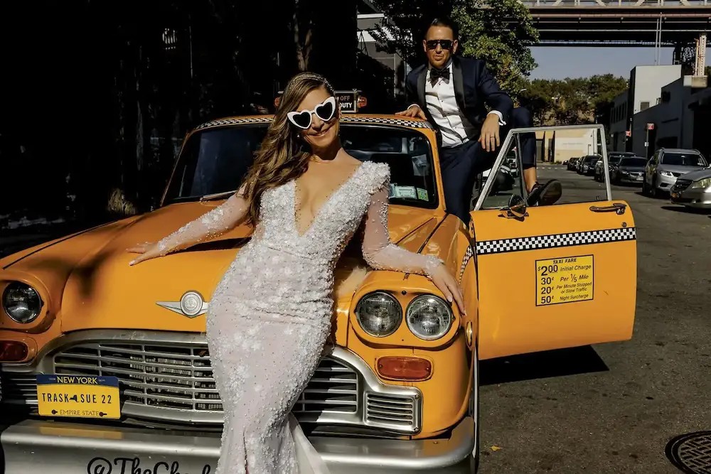 Susan Wears Long Sleeve Wedding Dress with Pearls and Floral Appliques. Mobile Image